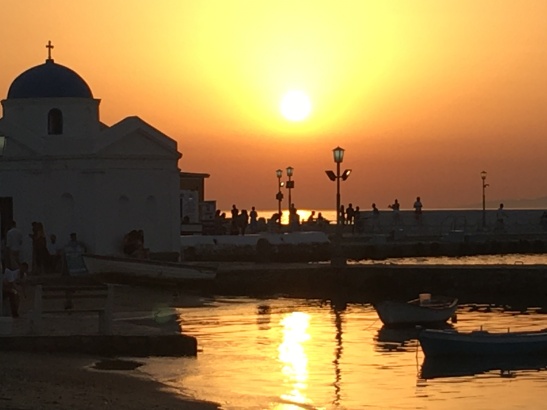 Sun setting behind Agios Nikolakis Church